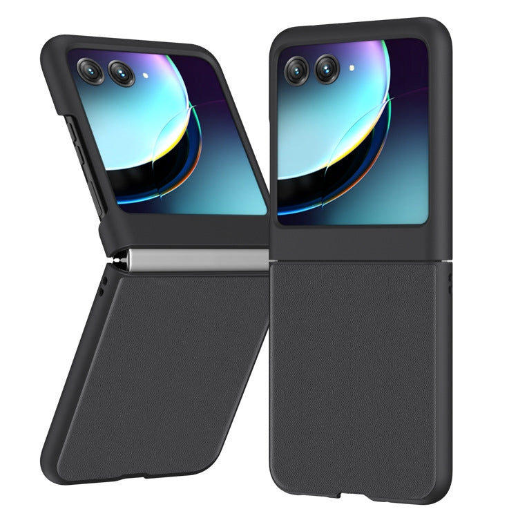 Black leather flip phone case with camera cutouts, front cover closed
