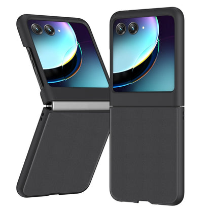 Black leather flip phone case with camera cutouts, front cover closed