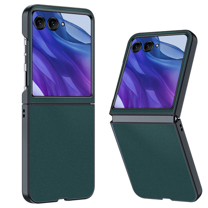 Dark green slim leather flip phone case with camera cutouts, hinged cover design