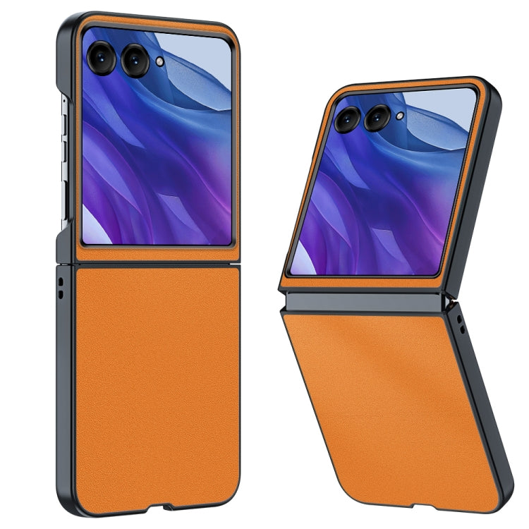 Orange slim leather flip phone case with camera cutouts, hinged cover design