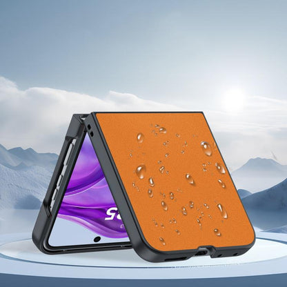 Ultra-thin orange leather folding phone case with water droplets on textured surface.