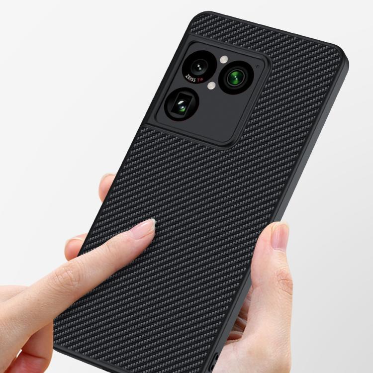 Black carbon-fiber texture phone case with camera cutouts, held in hand