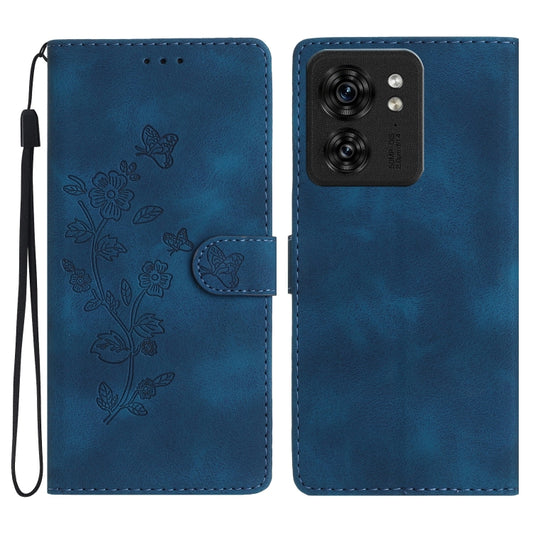 Blue embossed flower-and-butterfly leather phone case with flip cover and wrist strap.