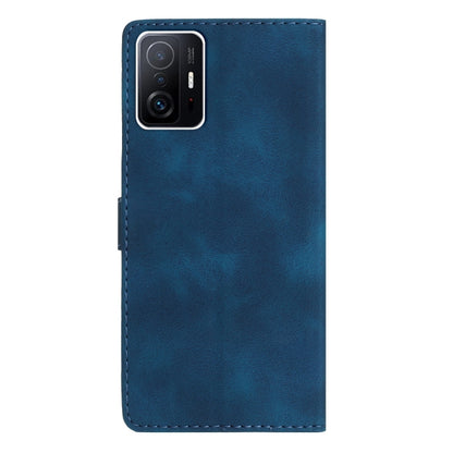 Blue leather phone case with camera cutout and stitched edges
