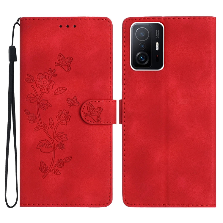 Red leather phone case with embossed flowers and butterflies, folio style and wrist strap