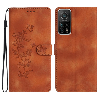 Brown leather wallet phone case with embossed floral and butterfly pattern, flip cover, wrist strap