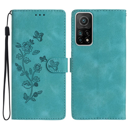 Teal leather wallet phone case with embossed floral and butterfly pattern, flip cover, wrist strap