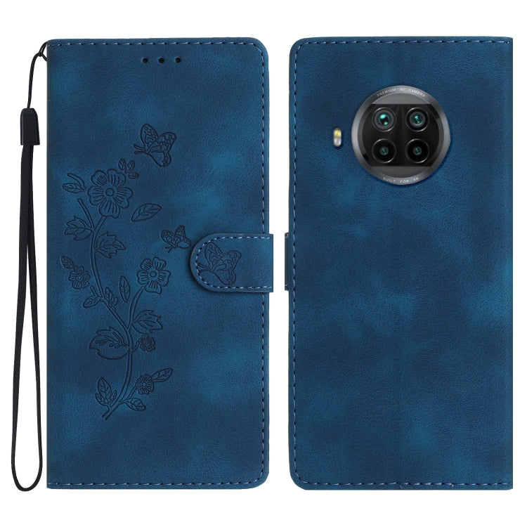 Blue leather folio phone case with embossed flowers and butterflies, wrist strap and camera cutout