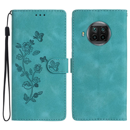 Sky blue leather folio phone case with embossed flowers and butterflies, wrist strap and camera cutout