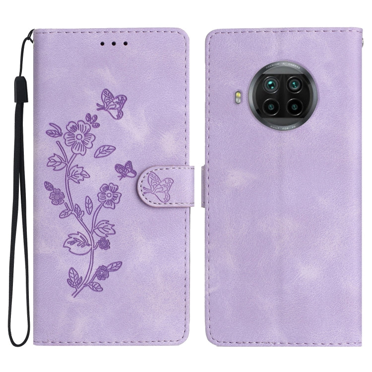 Purple leather wallet phone case with embossed floral and butterfly pattern, flip cover, wrist strap