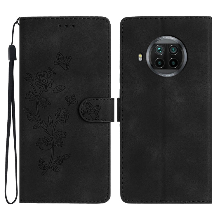 Black leather wallet phone case with embossed floral and butterfly pattern, flip cover, wrist strap