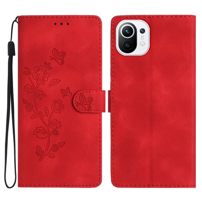 Red leather phone case with embossed flower and butterfly pattern, folio design