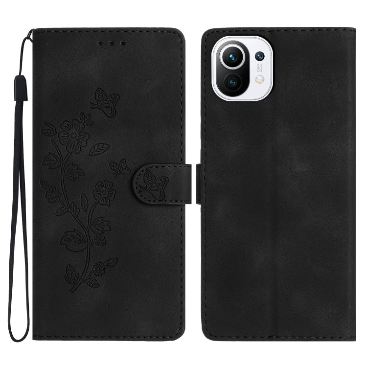 Black leather phone case with embossed flowers and butterfly, flip cover, wrist strap