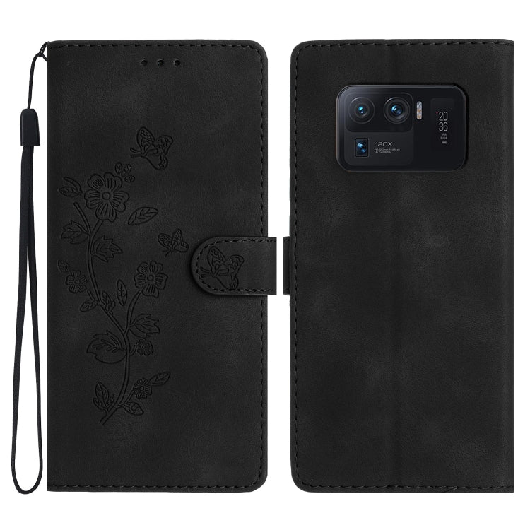 Black leather phone case with embossed flowers and butterfly, flip cover and camera cutout