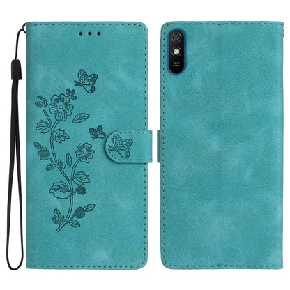 Leather phone case with embossed floral and butterfly pattern, flip wallet style, teal
