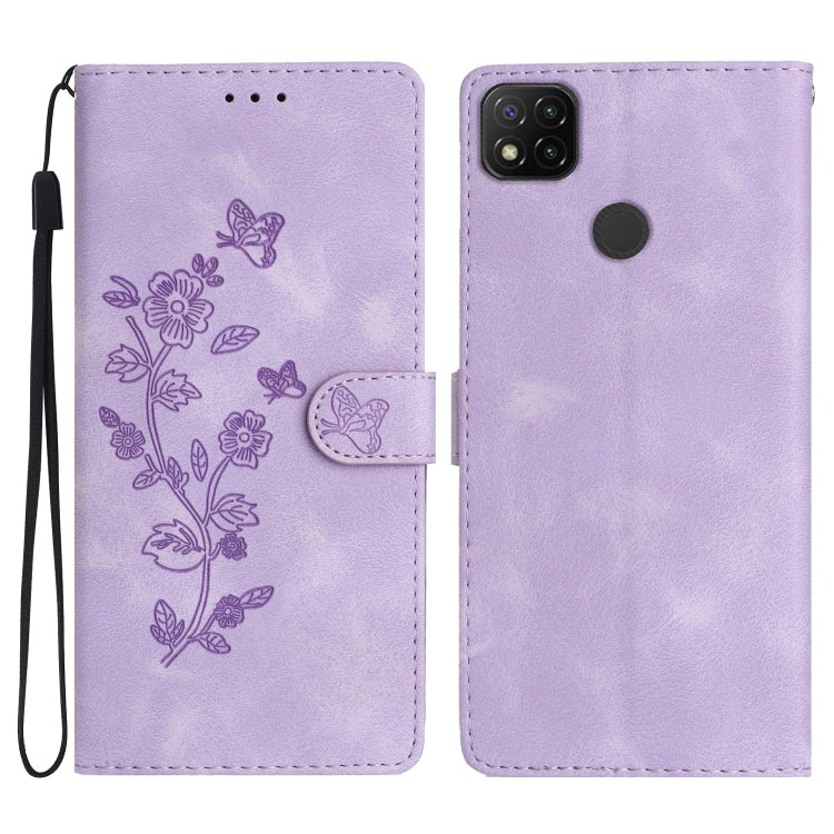 Purple embossed leather phone case with butterfly-flower pattern, wrist strap, flip cover.