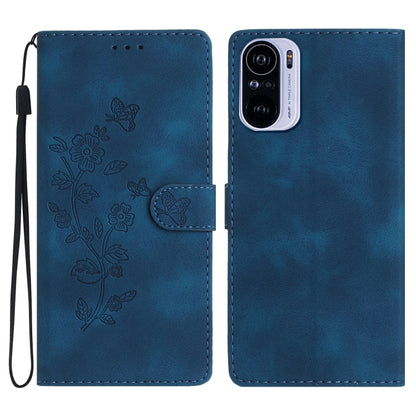 Blue leather phone case with embossed flower and butterfly pattern, magnetic flap