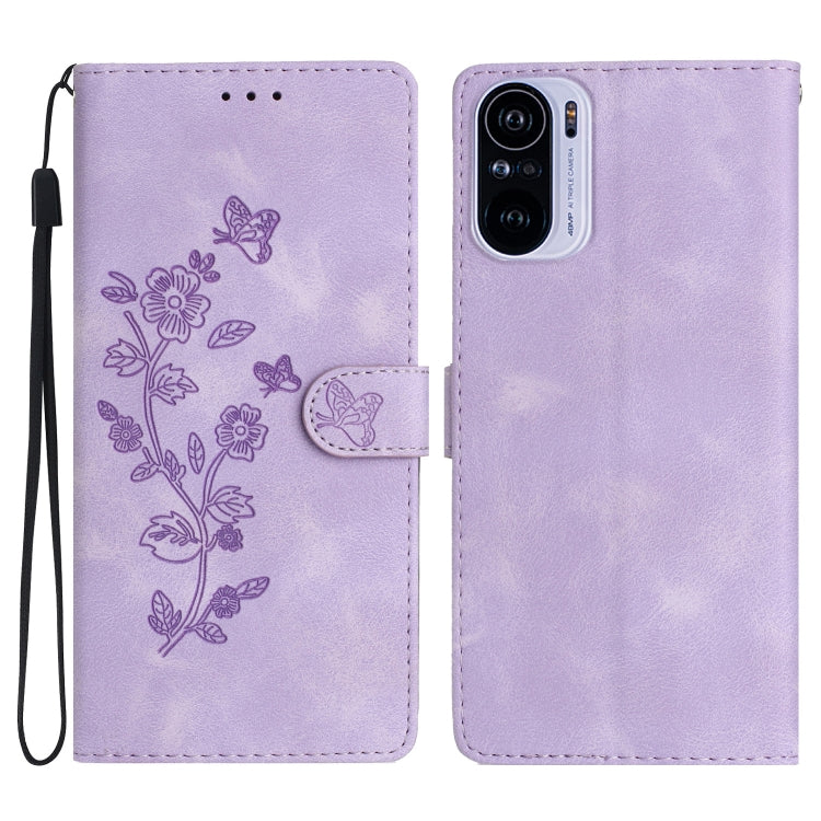 Light purple leather phone case with embossed flower and butterfly pattern, magnetic flap