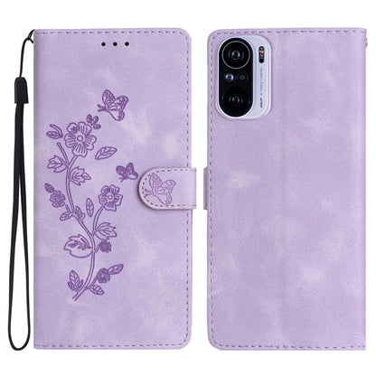 Light purple leather phone case with embossed flower and butterfly pattern, magnetic flap