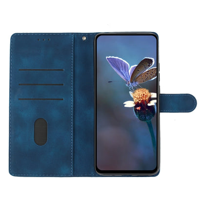 Blue leather folio phone case with side flip cover closed, window for viewing the screen