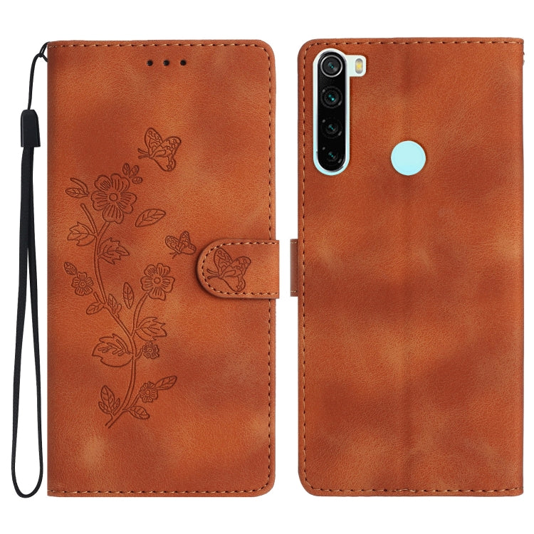 Brown leather folio phone case with embossed floral and butterfly pattern, side card slot