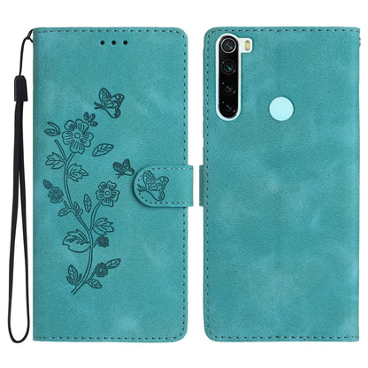 Teal leather folio phone case with embossed flowers and butterfly, card slot and wrist strap