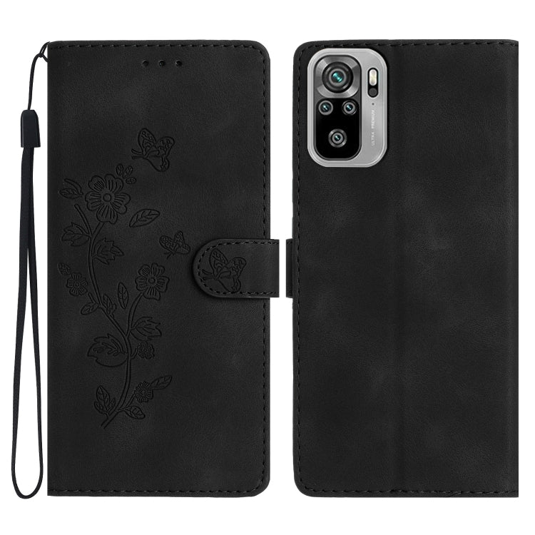 Black flip wallet phone case with embossed butterflies and flowers, with wrist strap