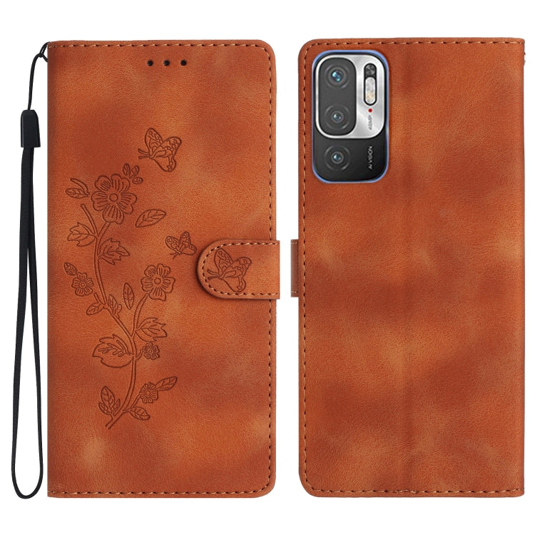 Brown leather folio phone case with embossed flower and butterfly pattern, card slot flap