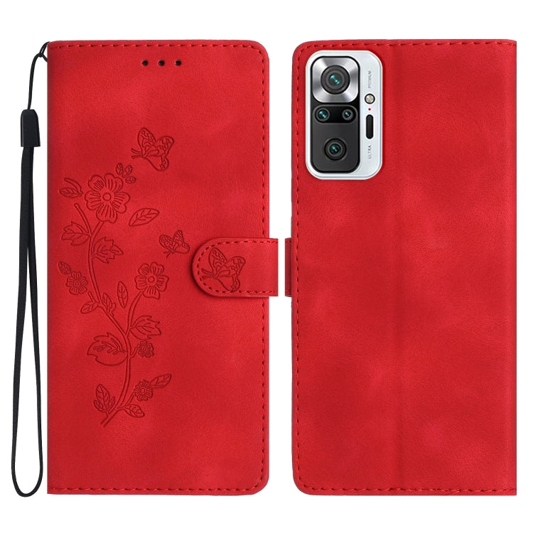 Red flip wallet phone case with embossed butterflies and flowers, with wrist strap