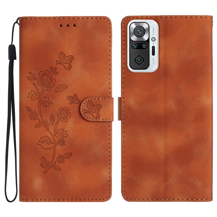 Brown leather phone case with embossed flower and butterfly pattern, magnetic flap
