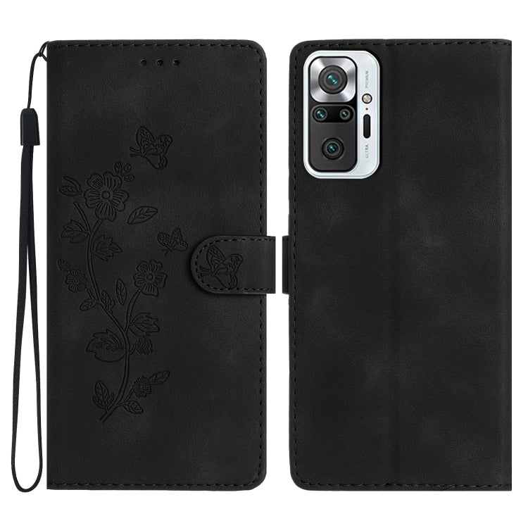 Black leather phone case with embossed flower and butterfly pattern, magnetic flap