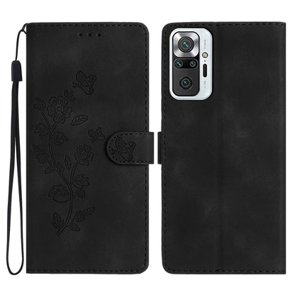 Black leather phone case with embossed flower and butterfly pattern, magnetic flap
