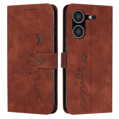 Brown leather-effect wallet phone case with heart motif and flip cover with camera cutout.