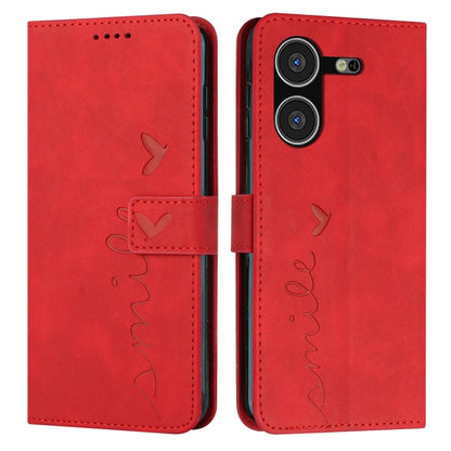 Red leather-effect wallet phone case with heart motif and flip cover with card slots.