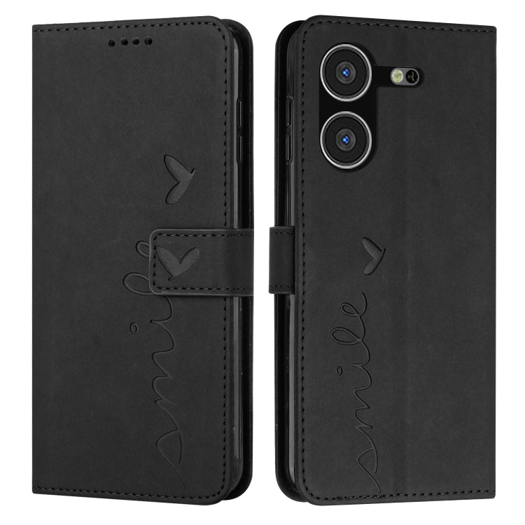 Black leather phone case with heart pattern and side strap, flip cover and camera openings
