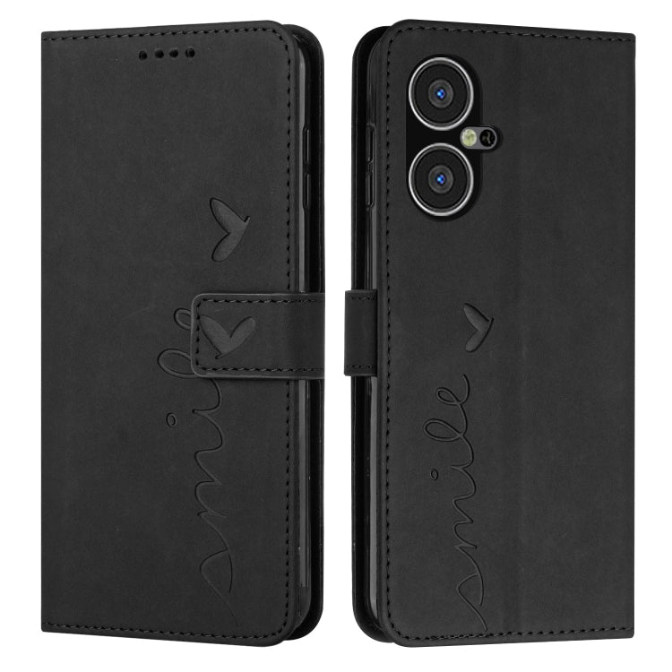 Black leather-effect wallet phone case with heart pattern and flip cover.