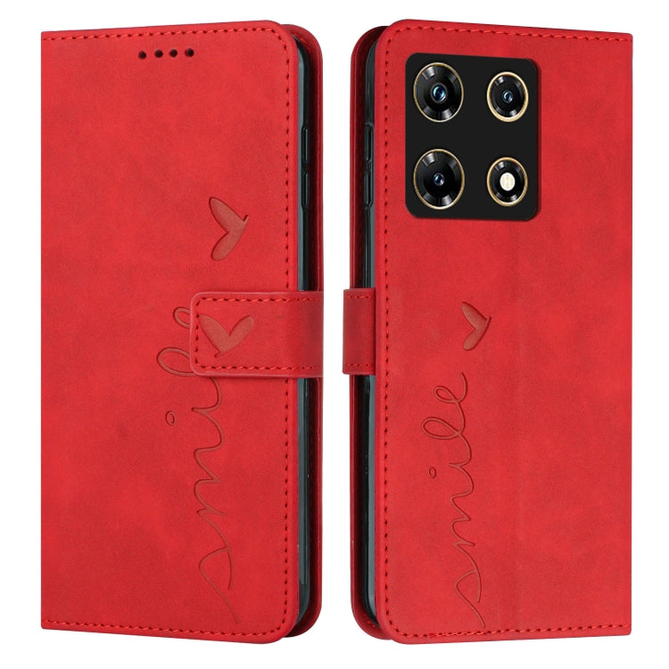 Red faux leather flip phone case with heart pattern, stitched edges, and camera cutout