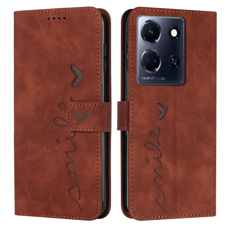 Brown leather wallet phone case with heart pattern and flip cover.