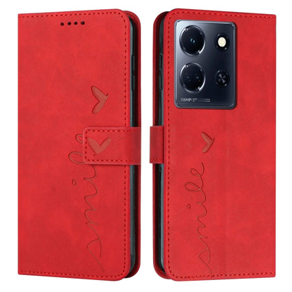 Red leather wallet phone case with heart pattern and flip cover.