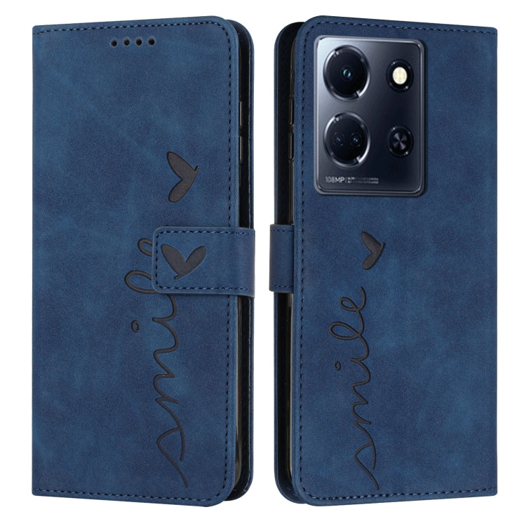 Blue leather wallet phone case with heart pattern and flip cover.