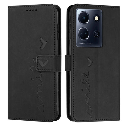 Black leather wallet phone case with heart pattern and flip cover.