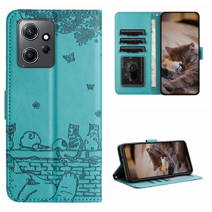 Teal cat-embossed leather-style phone case with lanyard and card slots for cards.
