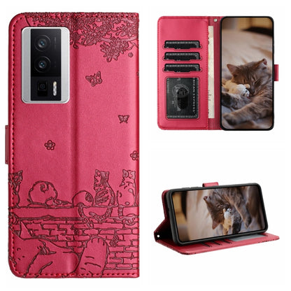 Red cat-embossed leather-style folio phone case with lanyard and card slots.