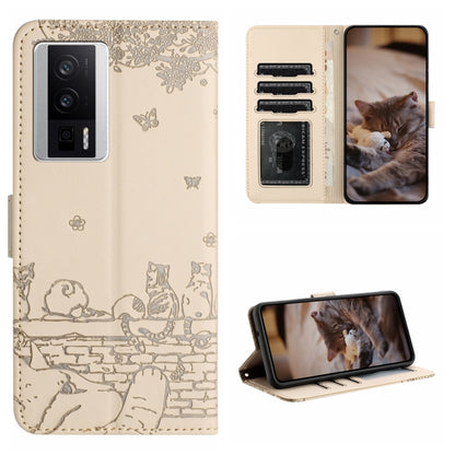 Beige cat embossed leather-style folio phone case with lanyard and card holder slots.