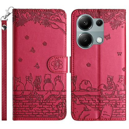 Red embossed cat pattern leather phone case with lanyard, two-piece wallet style.