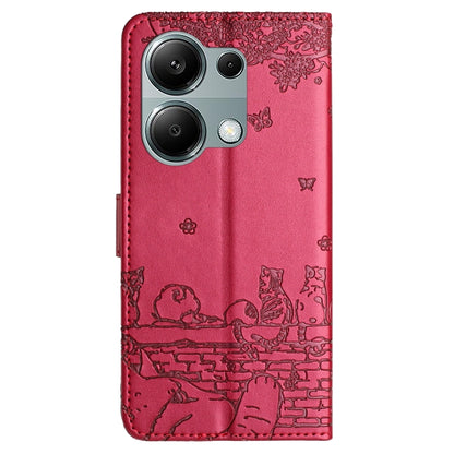 Red cat-embossed leather phone case with cutout for triple camera.