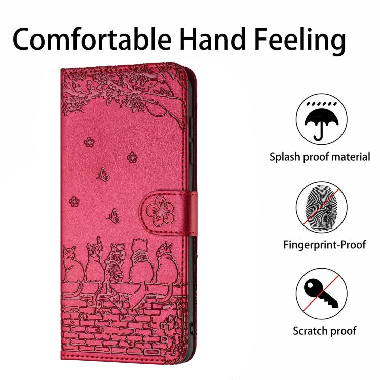 Red cat-embossed leather phone case, front flap with snap button.