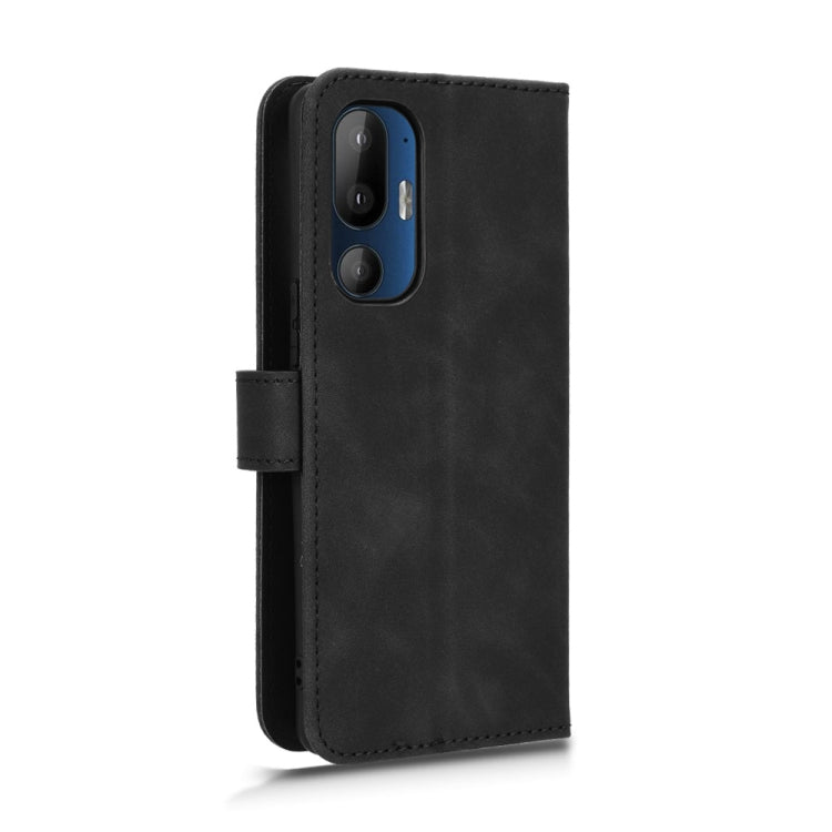 Black folio leather phone case with magnetic flap and dual camera cutout