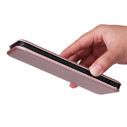 Pink carbon fiber texture flip phone case held in hand, side buttons exposed