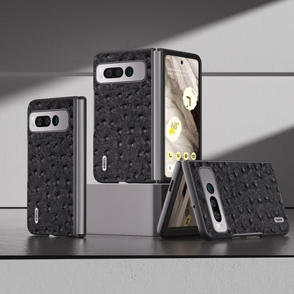 Black ostrich-textured leather fold phone case on display with hinge and camera cutout